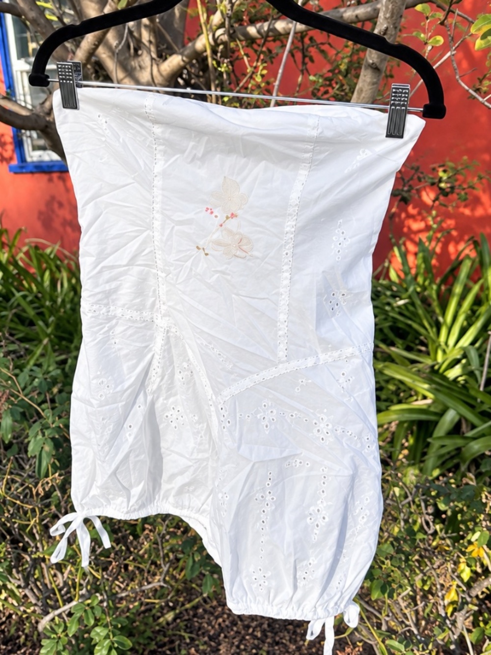 Serpenti White Baby Lamb Embroidered Eyelet Corset Romper